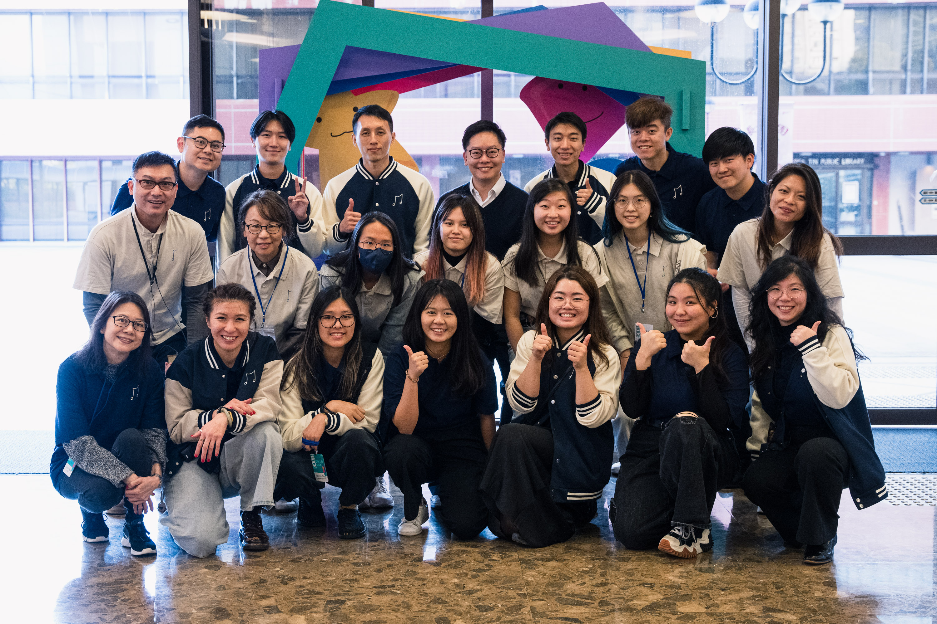 HKICF volunteers and event staff posing together after an event